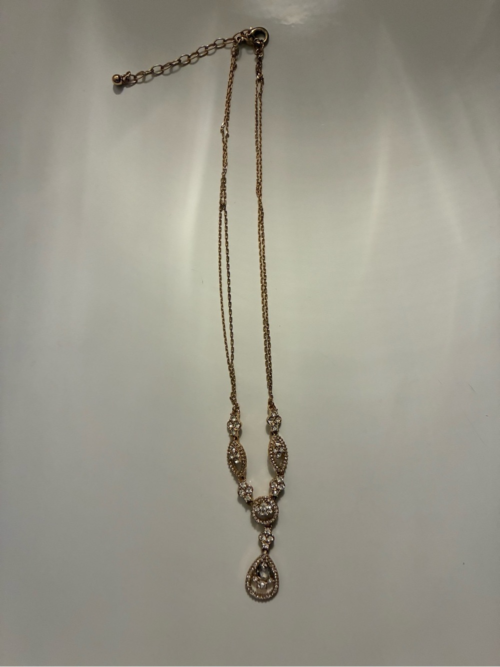 Elegant Gold-Tone Teardrop Pendant Necklace with Clear Crystals